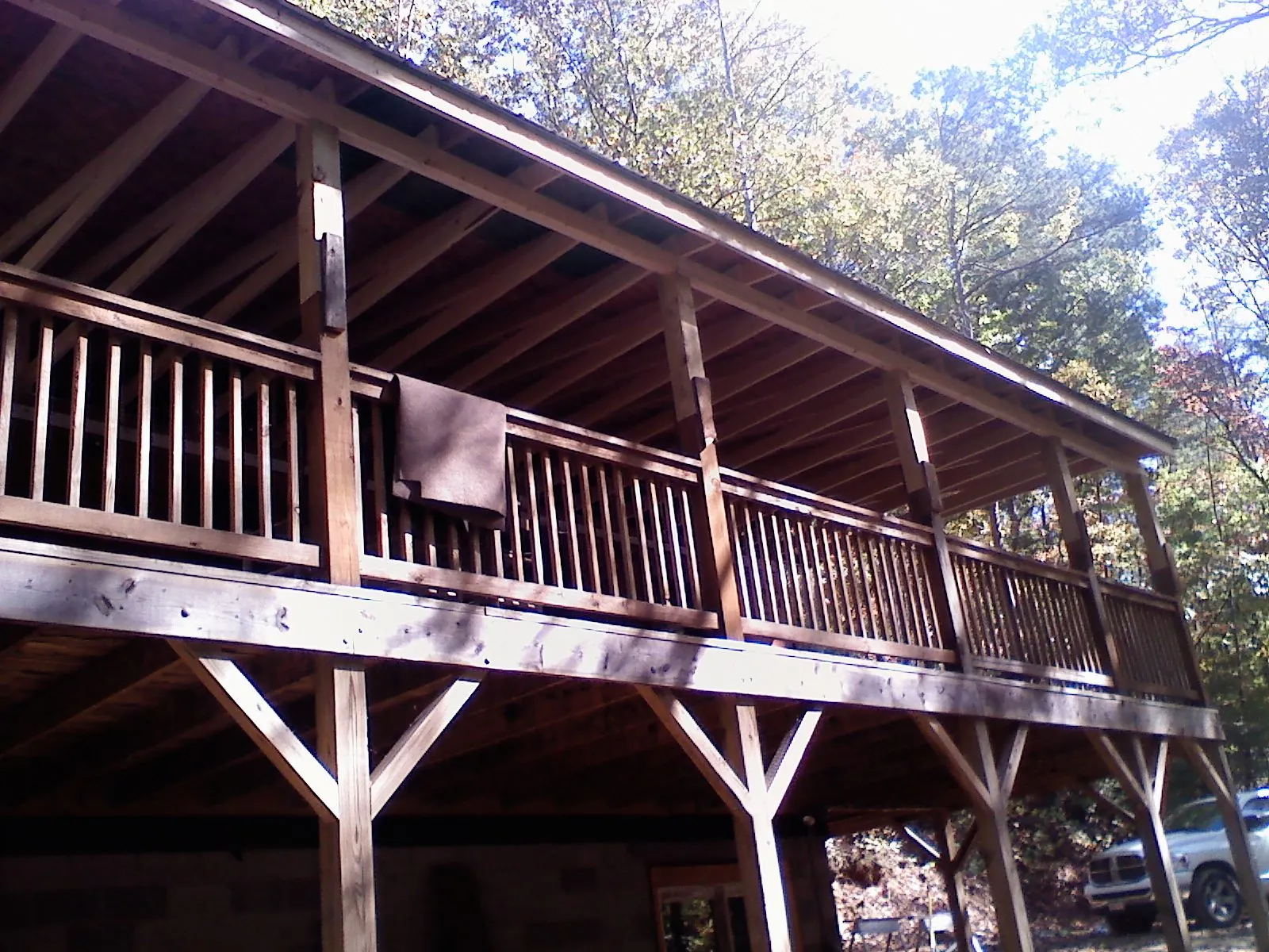 Timber framing under a new elevated porch and deck — Roof Leak Repair in Rock Hill by Roofing Brothers